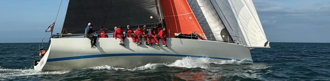 Black Pearl at the finish of the 2025 Rolex Fastnet Race. First boat to finish in the Admiral's Cup fleet. © Julia Castro/RORC